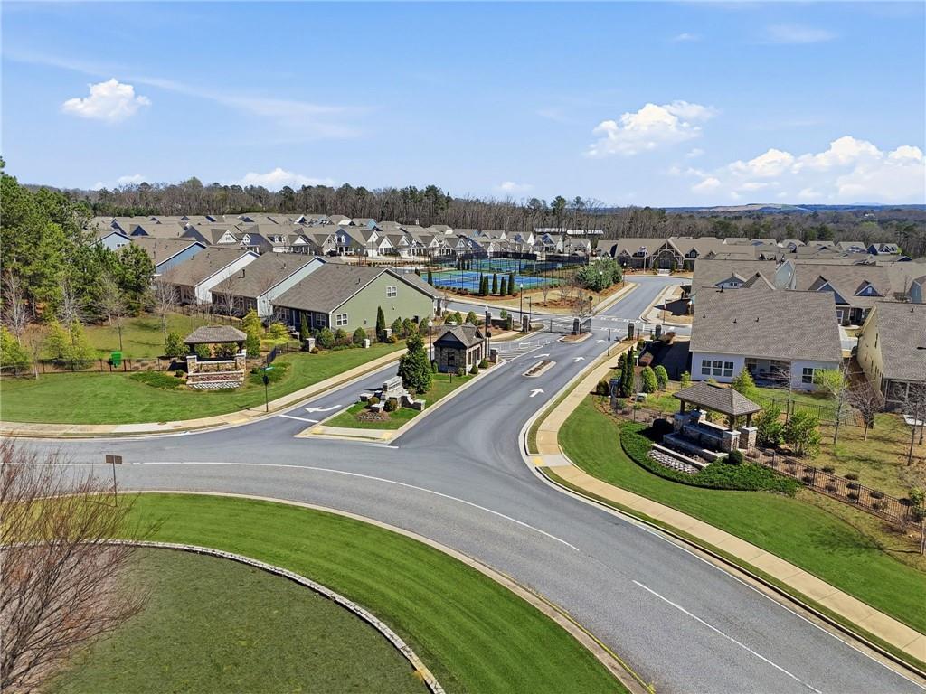 1413 Bluffs Ridge Way Canton, GA 30114 - Photo 59 of 62 an aerial view of a house with a big yard