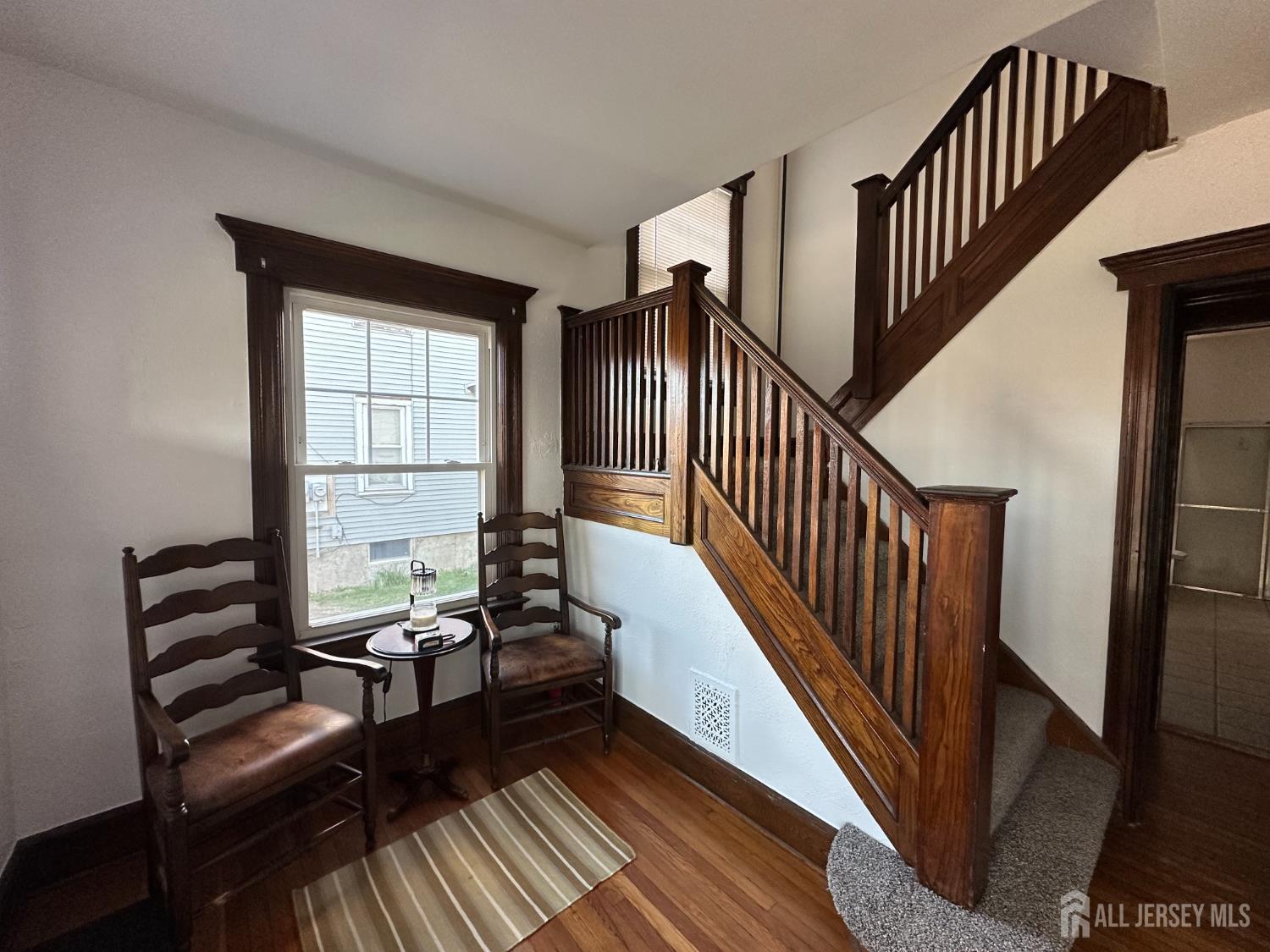 511 Grove Street Dunellen, NJ 08812 - Photo 2 of 9 a view of a balcony with chairs