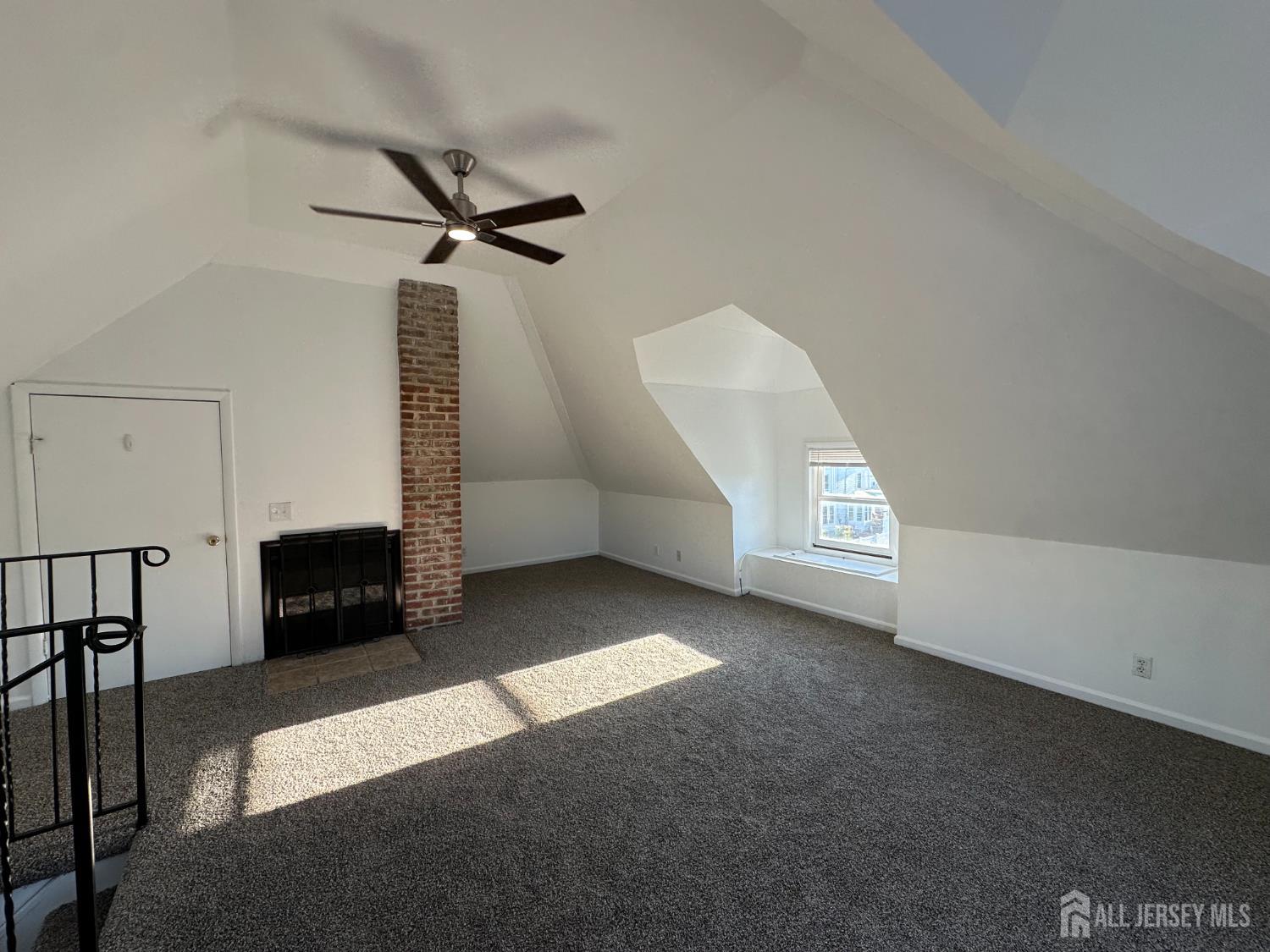 511 Grove Street Dunellen, NJ 08812 - Photo 3 of 9 a view of a livingroom with a fireplace