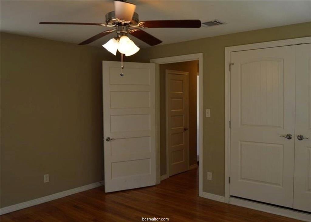 4309 Old College Road Bryan, TX 77801 - Photo 6 of 9 a view of a livingroom with wooden floor