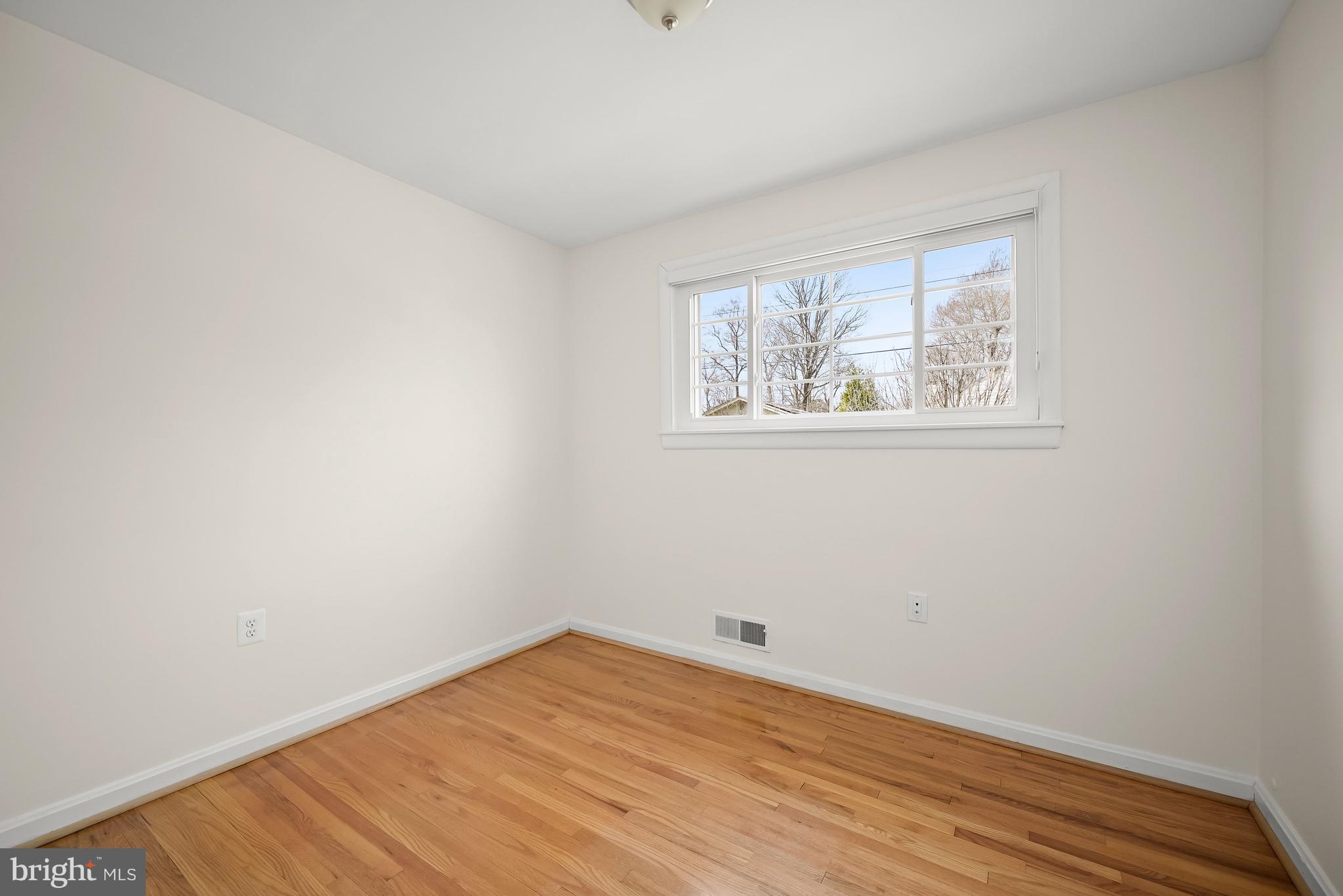 9809 Holmhurst Road Bethesda, MD 20817 - Photo 17 of 28 The Third Bedroom
