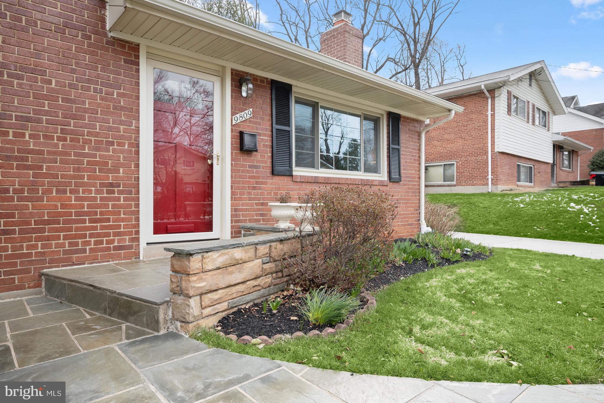 9809 Holmhurst Road Bethesda, MD 20817 - Photo 3 of 28 The handsome stone Front Path