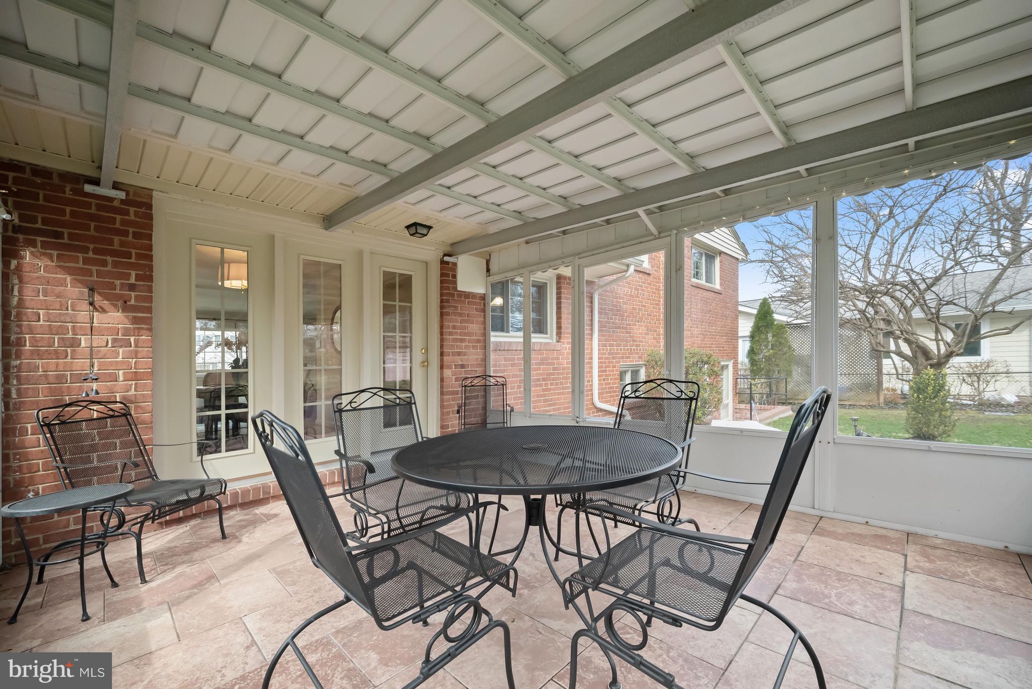 9809 Holmhurst Road Bethesda, MD 20817 - Photo 9 of 28 The Screened Porch
