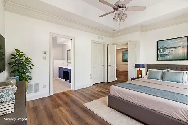 a view of a room with wooden floor