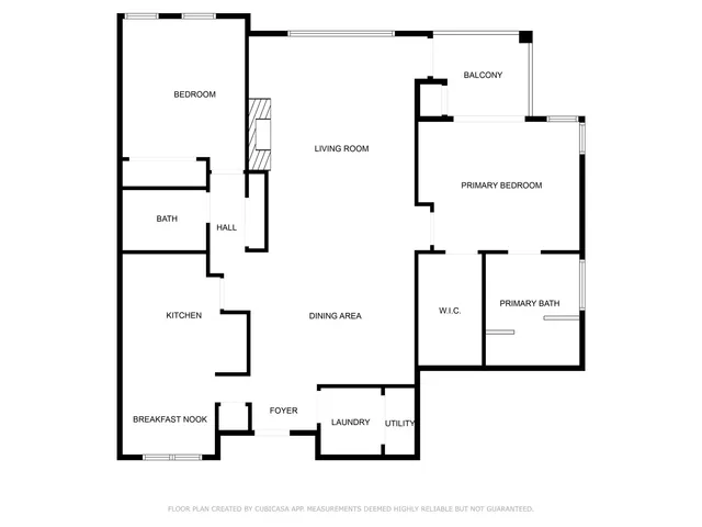 a view of a house with a porch and furniture