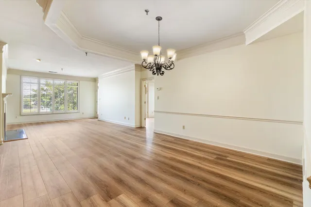 a kitchen with stainless steel appliances a stove and refrigerator
