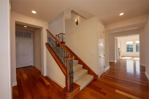 a bedroom with a bed and couch