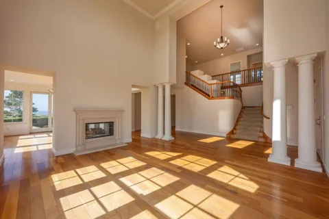 a view of a room with stairs and furniture