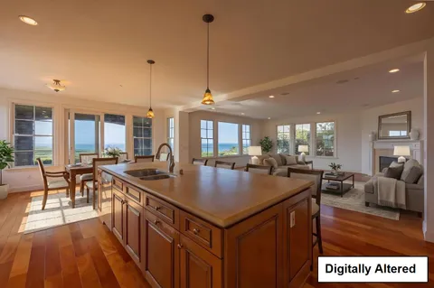 a view of a kitchen and living room