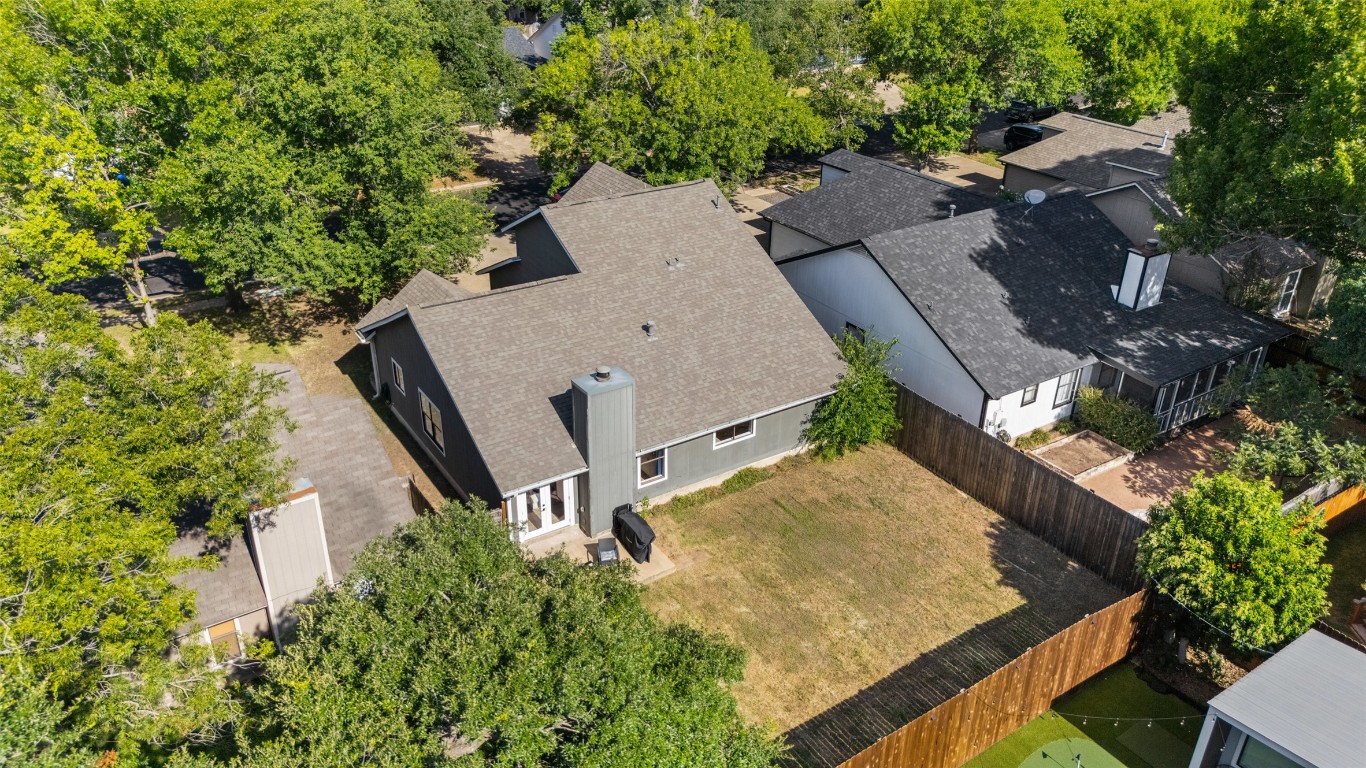 9833 Briar Ridge Drive Austin, TX 78748 - Photo 25 of 29 an aerial view of a house with yard