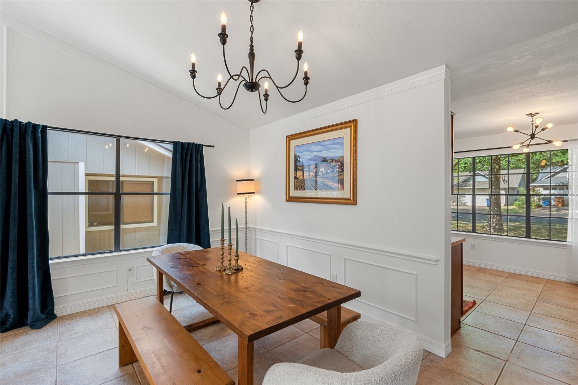 9833 Briar Ridge Drive Austin, TX 78748 - Photo 7 of 29 a view of a dining room with furniture window and outside view