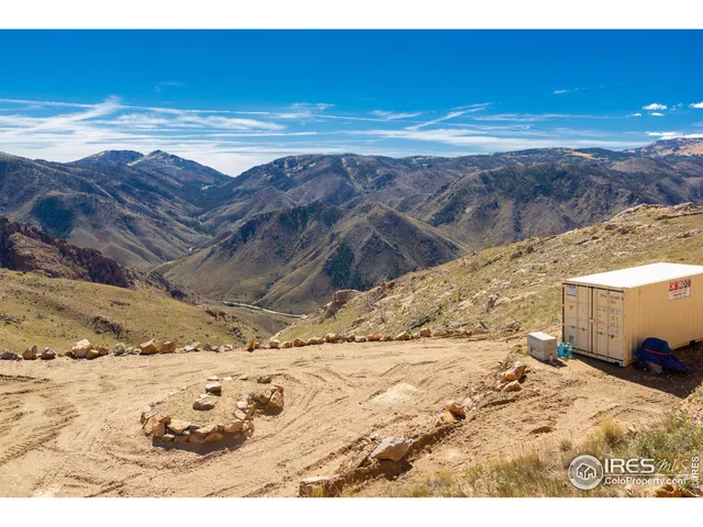 a view of ocean view with wooden fence