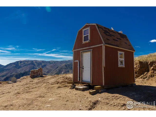 a view of a yard from a balcony
