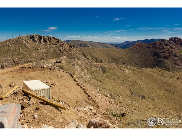 a view of ocean and a mountain