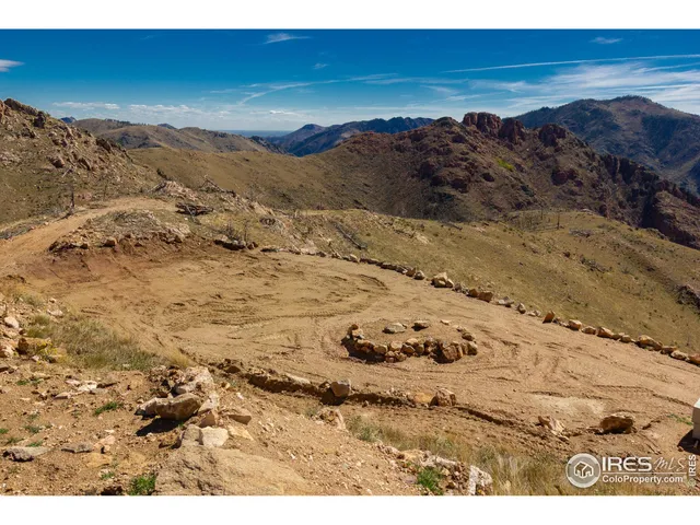 a view of wooden floor and a building in the background