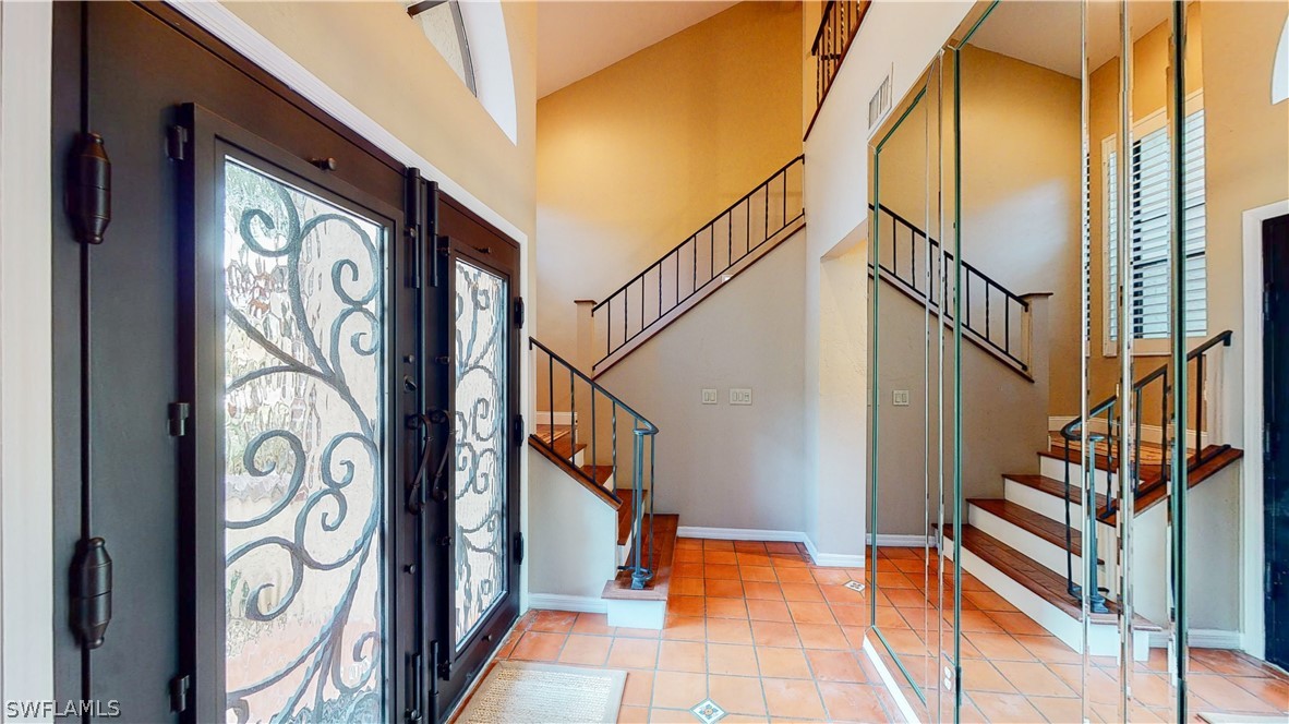 14565 Eagle Ridge Drive Fort Myers, FL 33912 - Photo 11 of 28 a view of front door with stairs