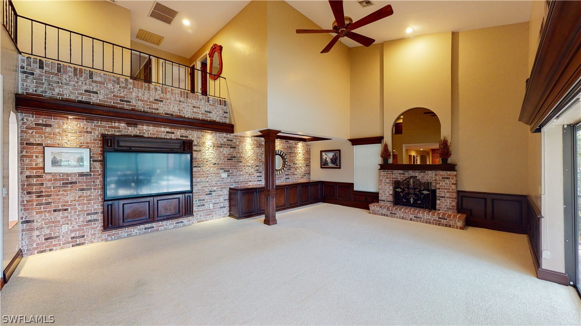 14565 Eagle Ridge Drive Fort Myers, FL 33912 - Photo 12 of 28 a view of livingroom with furniture and a fireplace