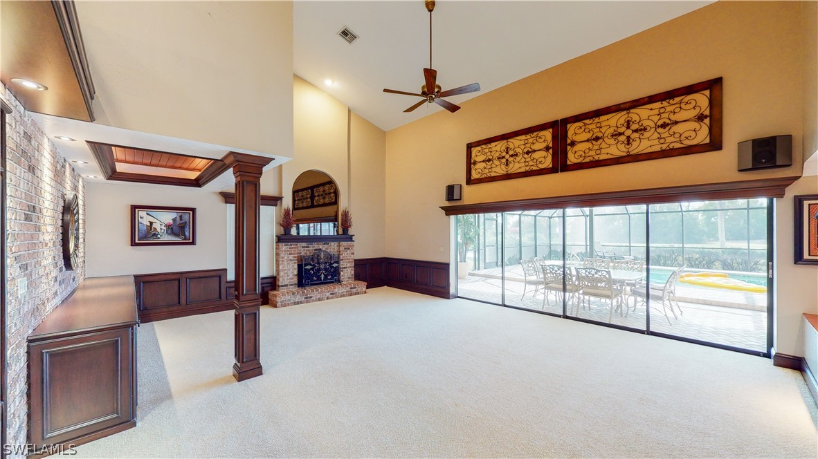 14565 Eagle Ridge Drive Fort Myers, FL 33912 - Photo 13 of 28 a living room with furniture and a large window