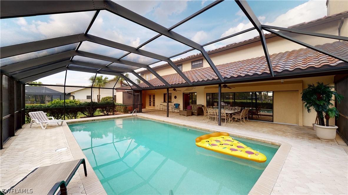 14565 Eagle Ridge Drive Fort Myers, FL 33912 - Photo 25 of 28 a view of swimming pool with outdoor seating