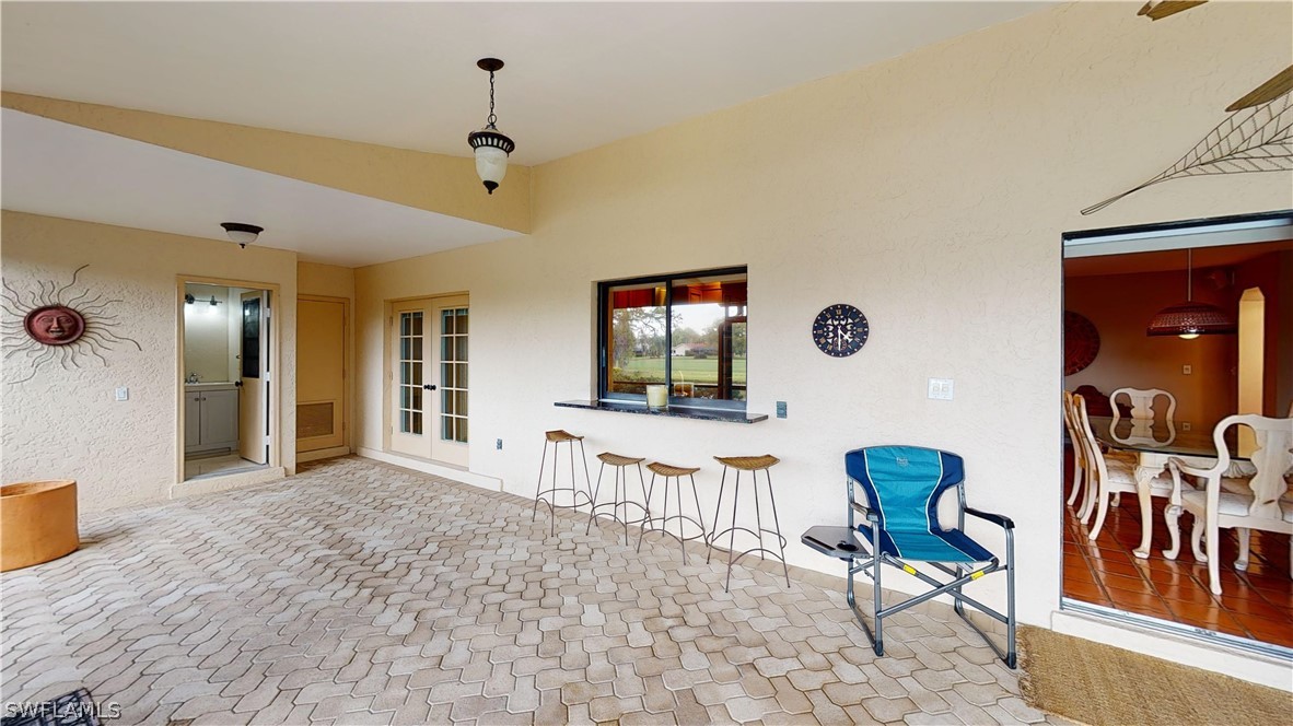 14565 Eagle Ridge Drive Fort Myers, FL 33912 - Photo 26 of 28 a living room with furniture