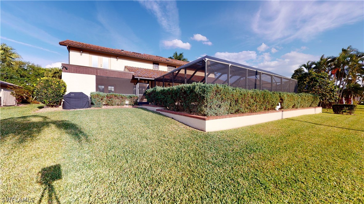 14565 Eagle Ridge Drive Fort Myers, FL 33912 - Photo 28 of 28 a view of a house with a yard