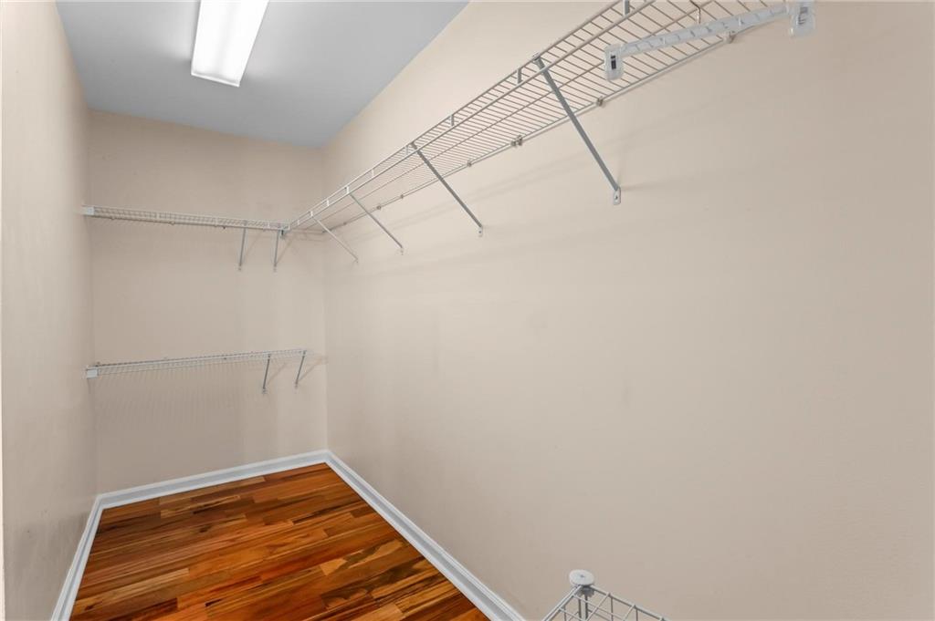 3650 Ashford Dunwoody Road Northeast, Unit 227 Atlanta, GA 30319 - Photo 16 of 23 a view of a room with racks on the wall