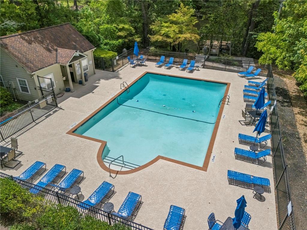 3650 Ashford Dunwoody Road Northeast, Unit 227 Atlanta, GA 30319 - Photo 21 of 23 an aerial view of a house with outdoor space