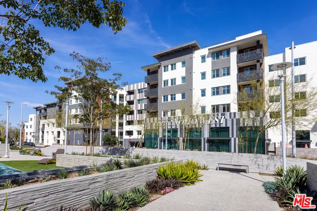 a front view of a building with street view