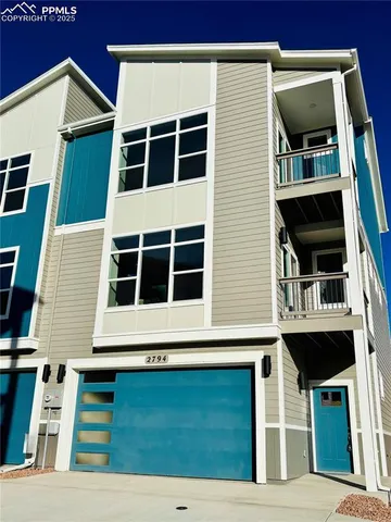 a view of front door of house with a window