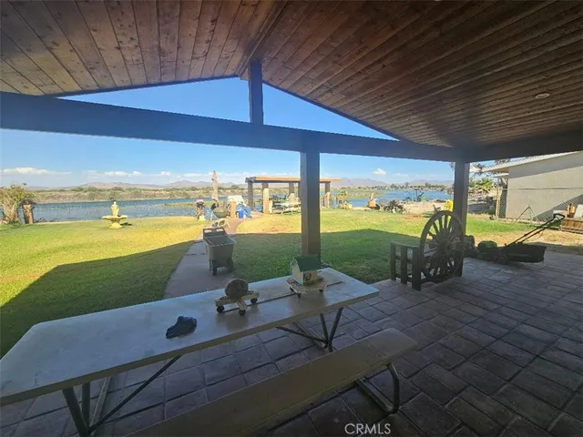 a view of a swimming pool with a patio