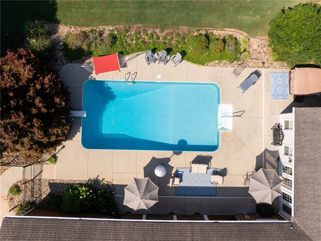 3513 Hopewell Road Anderson, SC 29621 - Photo 39 of 50 An aerial perspective reveals a sparkling pool set in a private outdoor oasis, ideal for relaxation and entertaining.