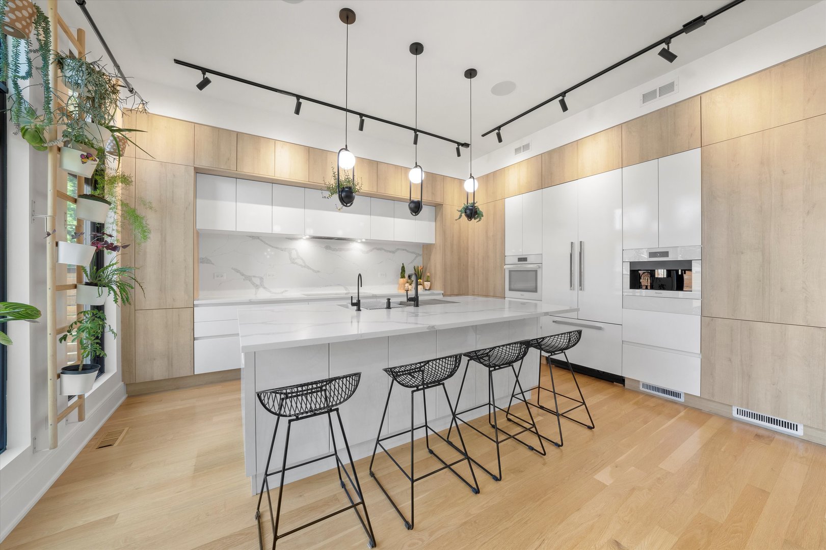 215 Eagle Street Naperville, IL 60540 - Photo 13 of 50 a kitchen with a table and chairs in it