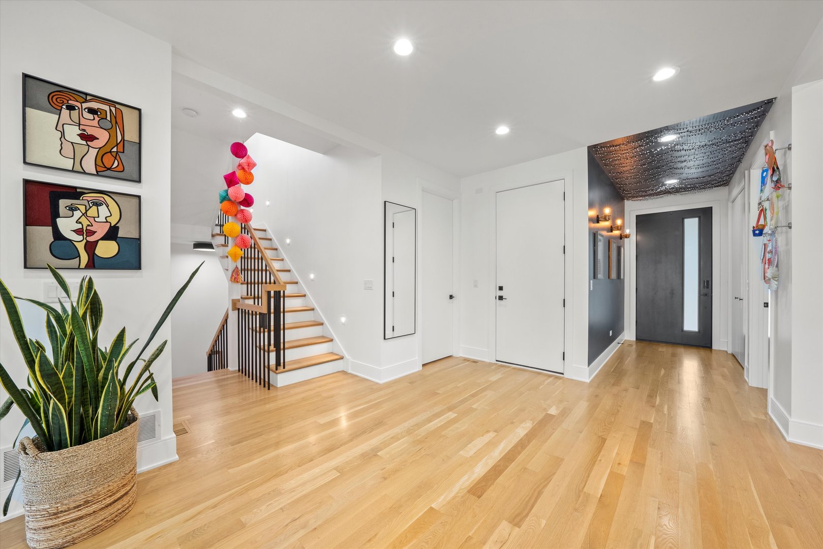215 Eagle Street Naperville, IL 60540 - Photo 19 of 50 a view of entryway and hall with wooden floor