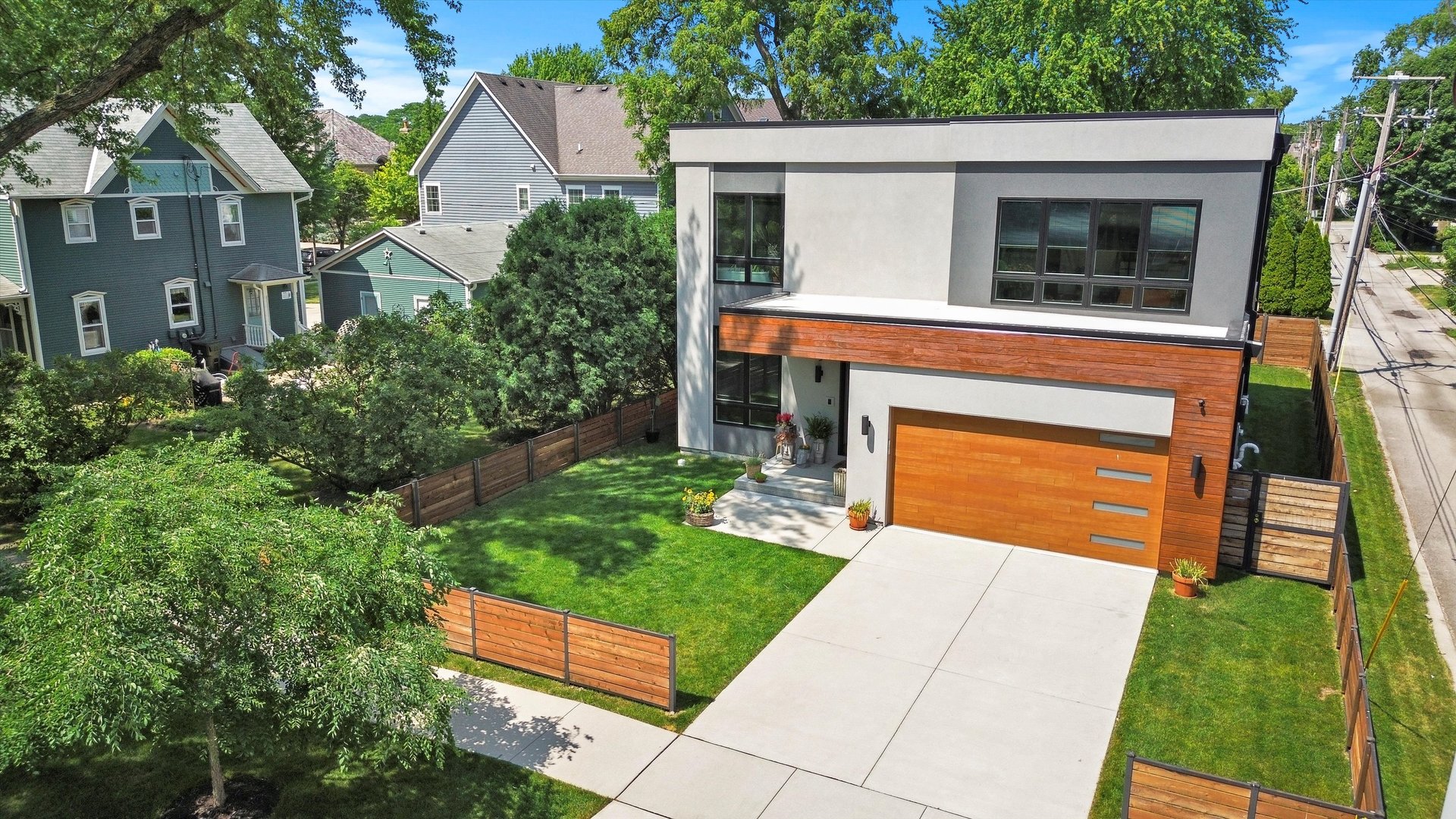 215 Eagle Street Naperville, IL 60540 - Photo 2 of 50 a front view of a house with a yard