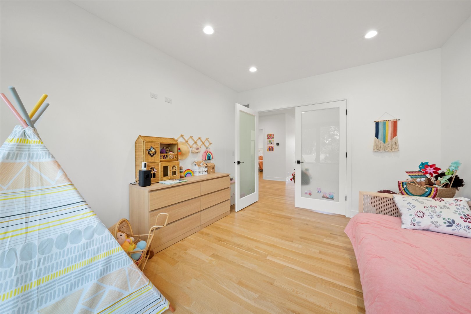 215 Eagle Street Naperville, IL 60540 - Photo 30 of 50 a bedroom with a bed and a dresser