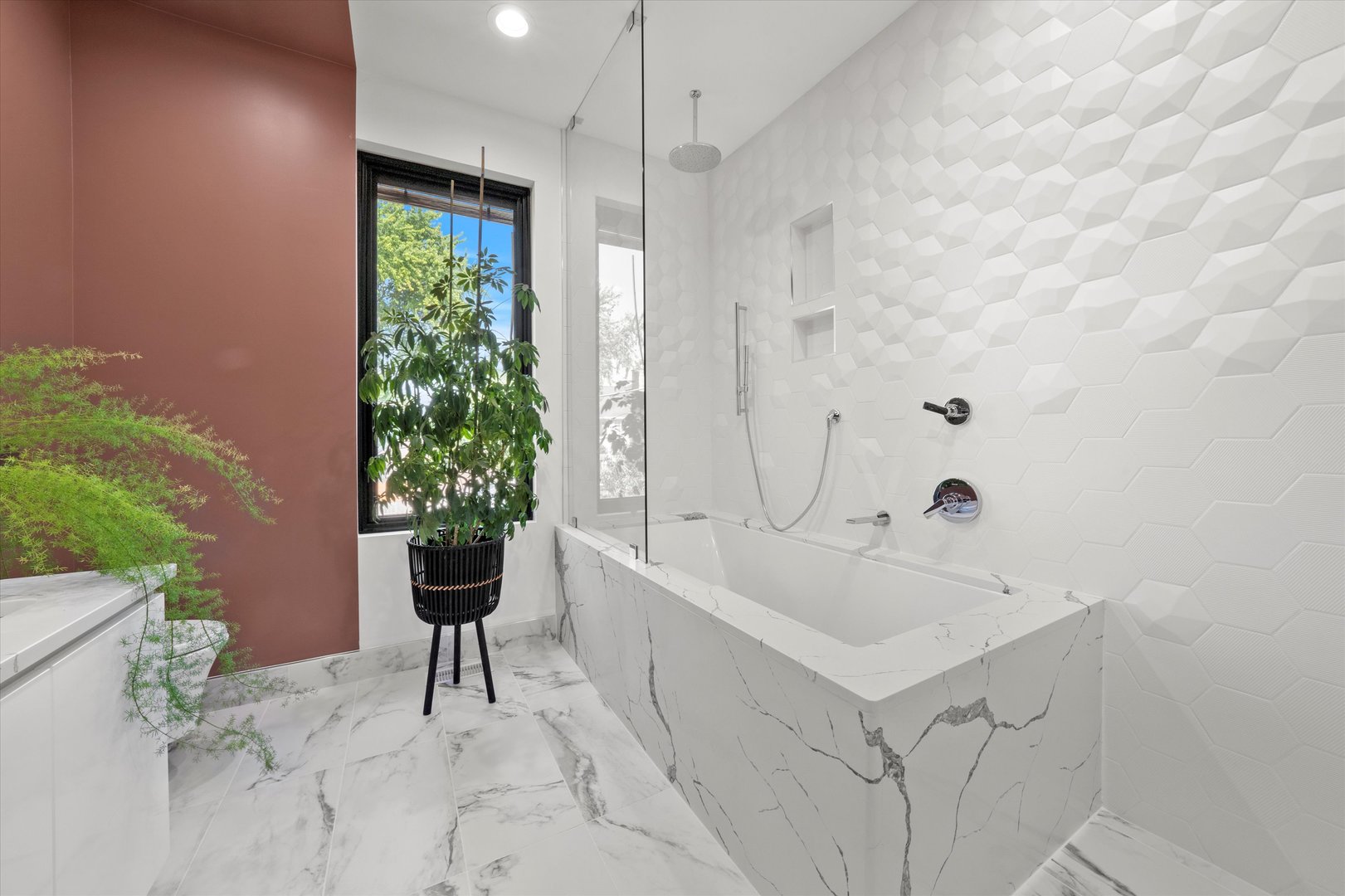 215 Eagle Street Naperville, IL 60540 - Photo 32 of 50 a bathroom with a sink a toilet and a bathtub