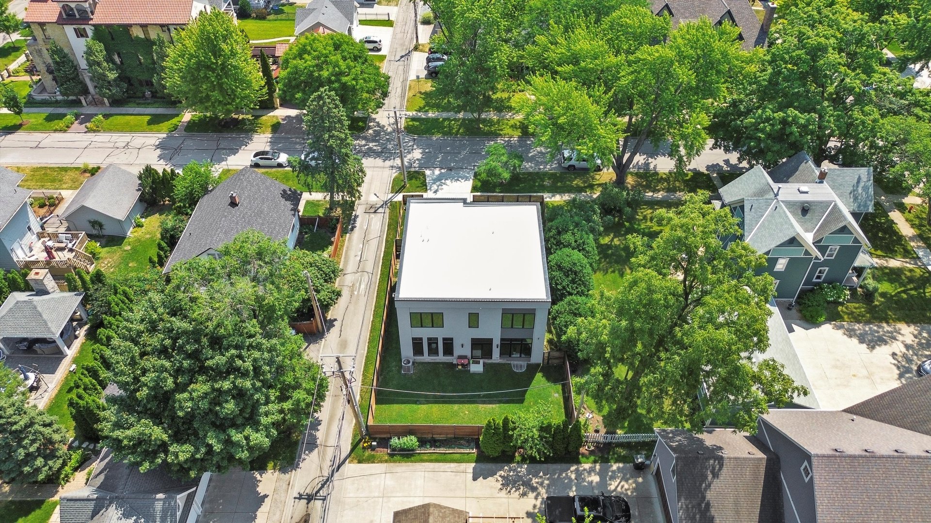 215 Eagle Street Naperville, IL 60540 - Photo 47 of 50 an aerial view of a house with a garden and outdoor space
