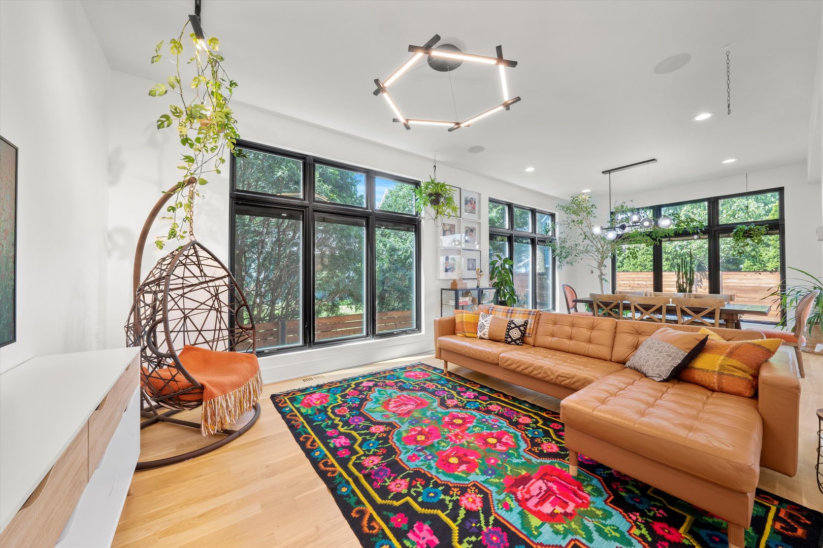 215 Eagle Street Naperville, IL 60540 - Photo 6 of 50 a living room with furniture and a floor to ceiling window