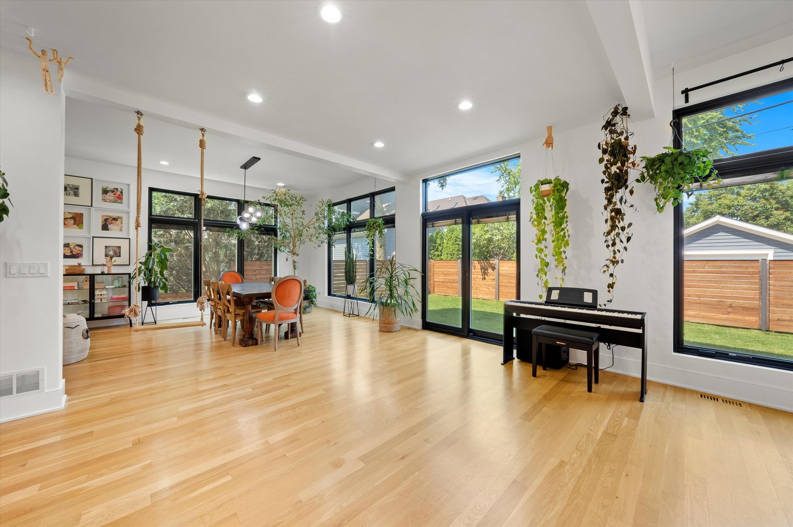 215 Eagle Street Naperville, IL 60540 - Photo 9 of 50 a view of living room with furniture and floor to ceiling window