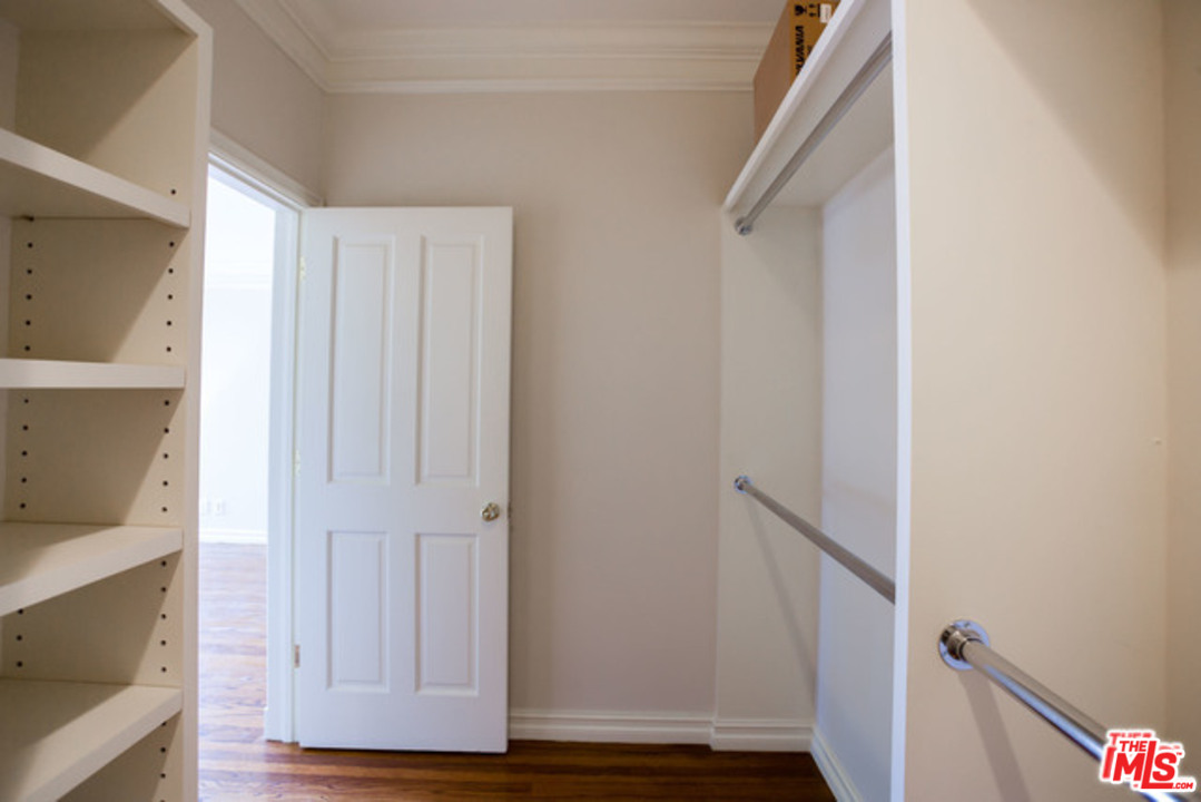 171 South Rodeo Drive Beverly Hills, CA 90212 - Photo 15 of 21 a view of front door with wooden floor