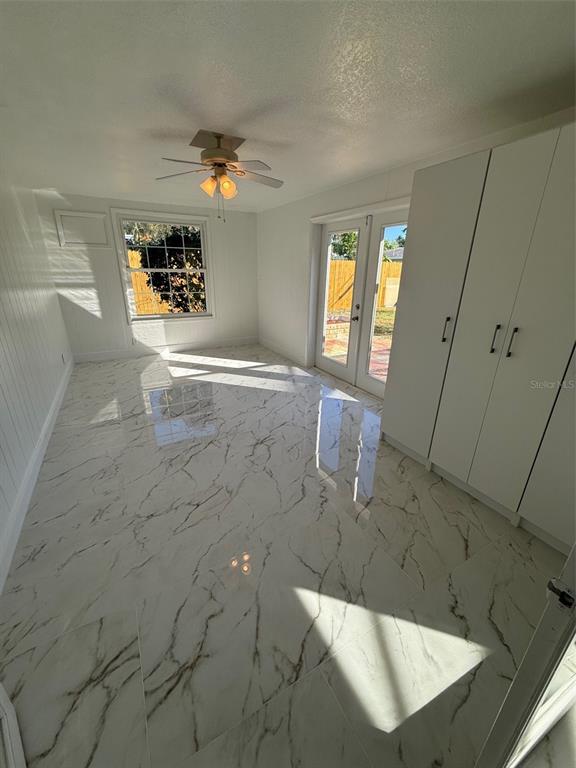 1007 Normandy Road Clearwater, FL 33764 - Photo 34 of 49 Second bedroom with exit to the pool area