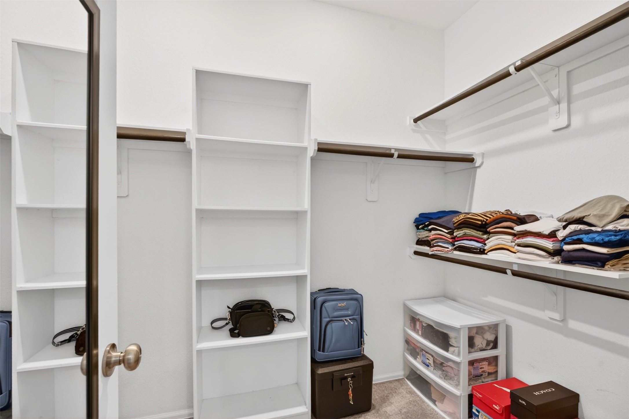 2832 Mistygate Court Conroe, TX 77301 - Photo 20 of 50 Primary closet with built-in shelving!