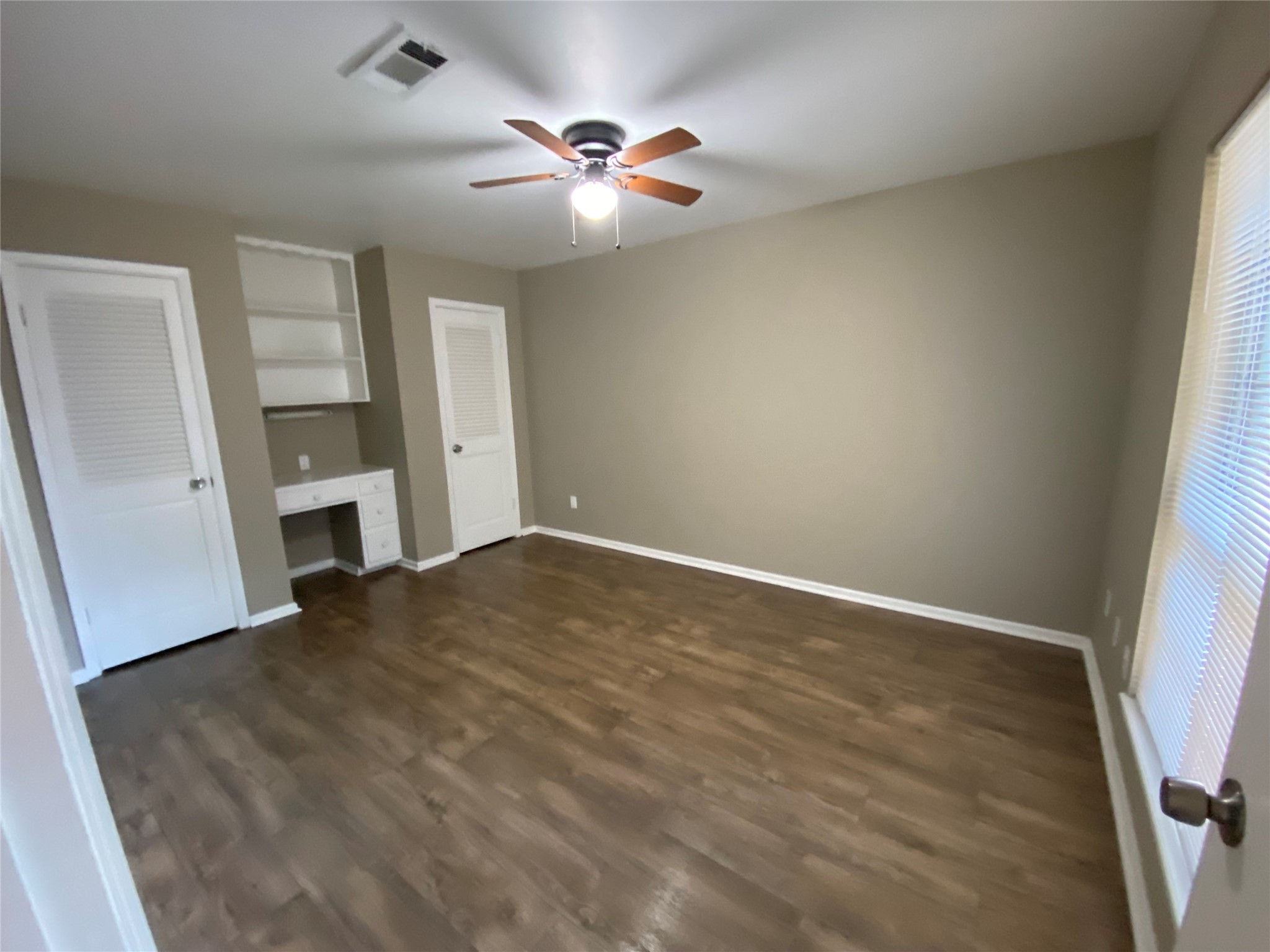 1408 Ward Bend Road Sealy, TX 77474 - Photo 22 of 36 wooden floor in an empty room with a fireplace