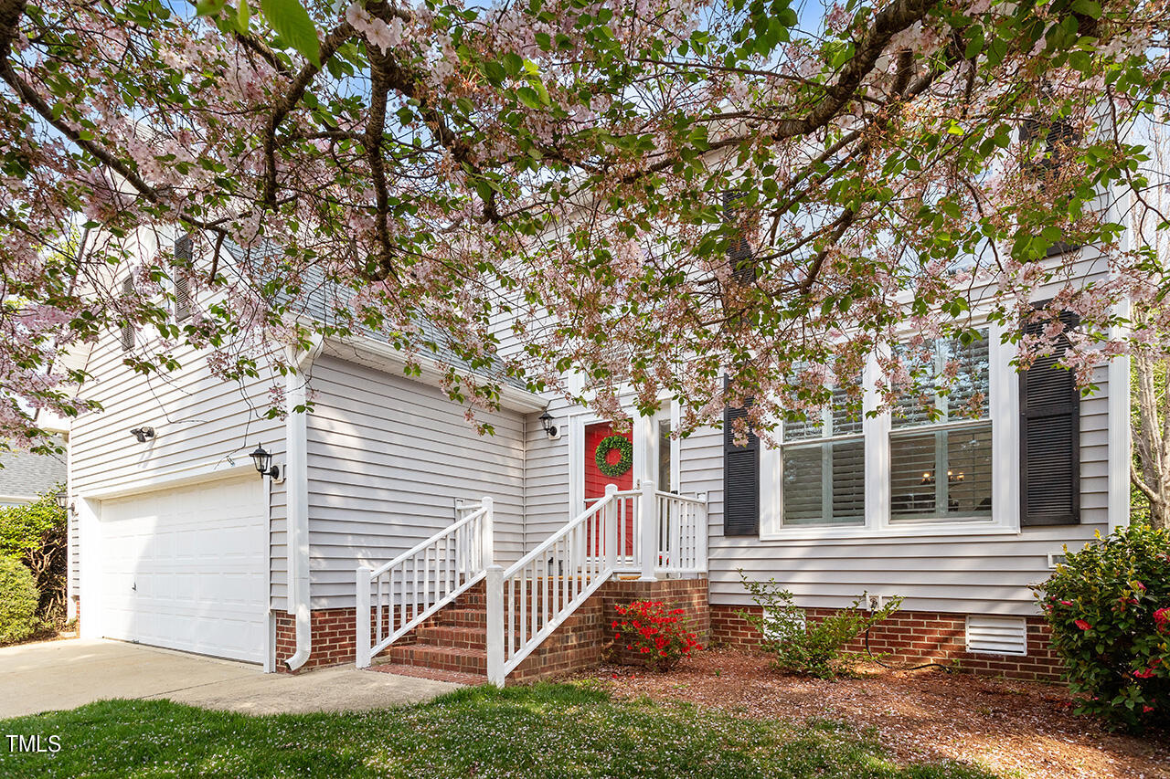 2320 Kendricks Court Raleigh, NC 27613 - Photo 3 of 35 a front view of a house with a yard
