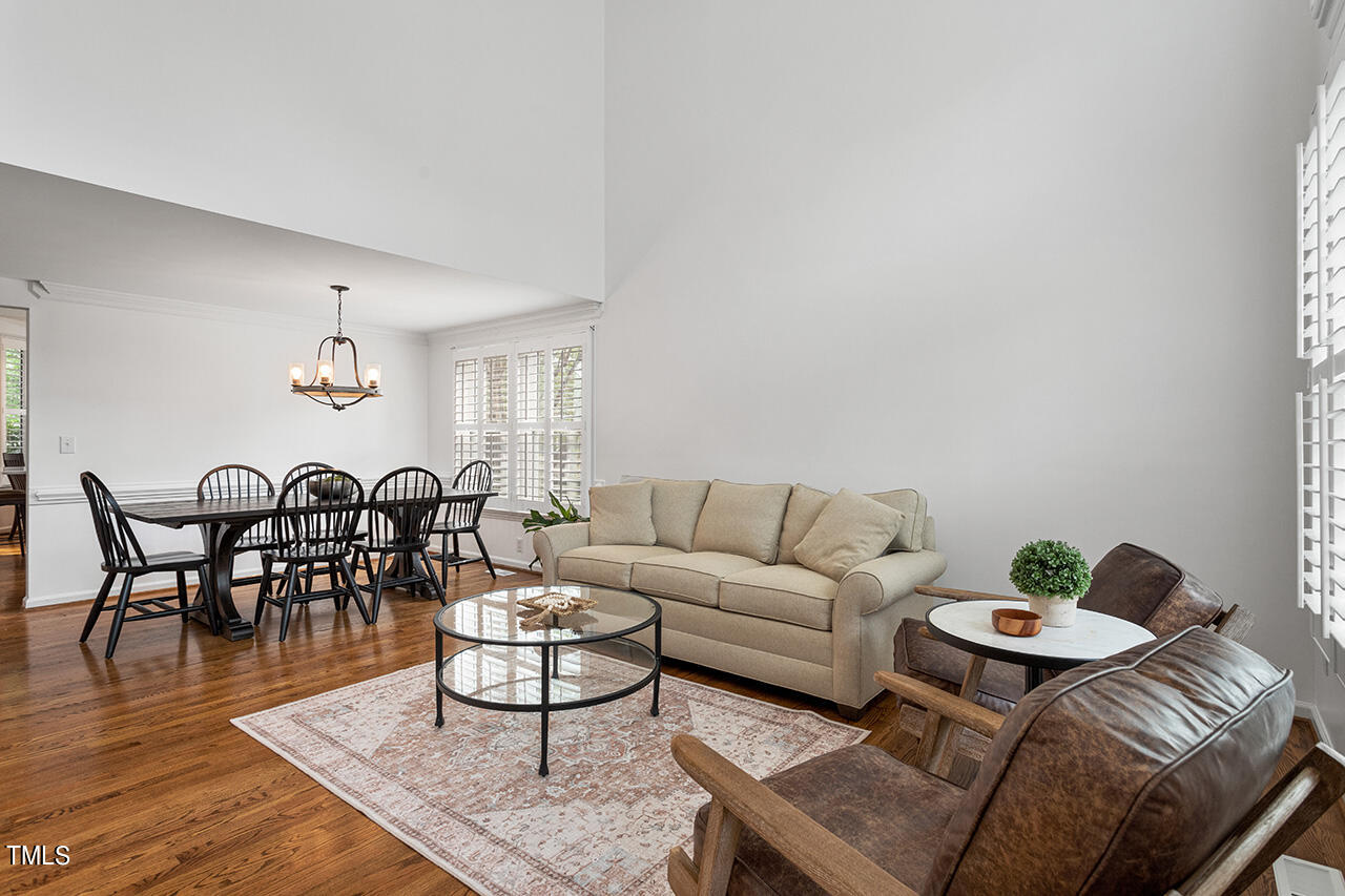 2320 Kendricks Court Raleigh, NC 27613 - Photo 5 of 35 a living room with furniture and wooden floor