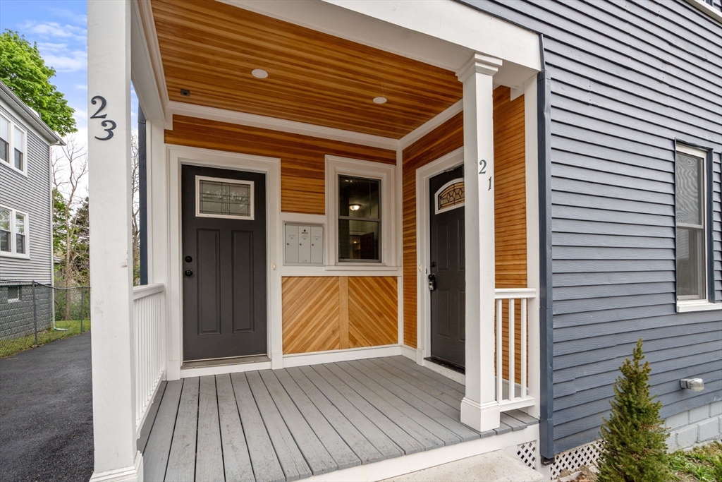 21-23 Westmore Road Boston, MA 02126 - Photo 2 of 42 a view of front door of house