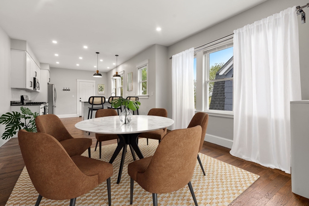 21-23 Westmore Road Boston, MA 02126 - Photo 21 of 42 a view of a dining room with furniture