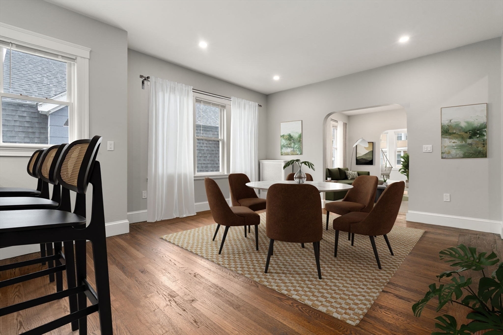 21-23 Westmore Road Boston, MA 02126 - Photo 22 of 42 a view of a dining room with furniture window and wooden floor