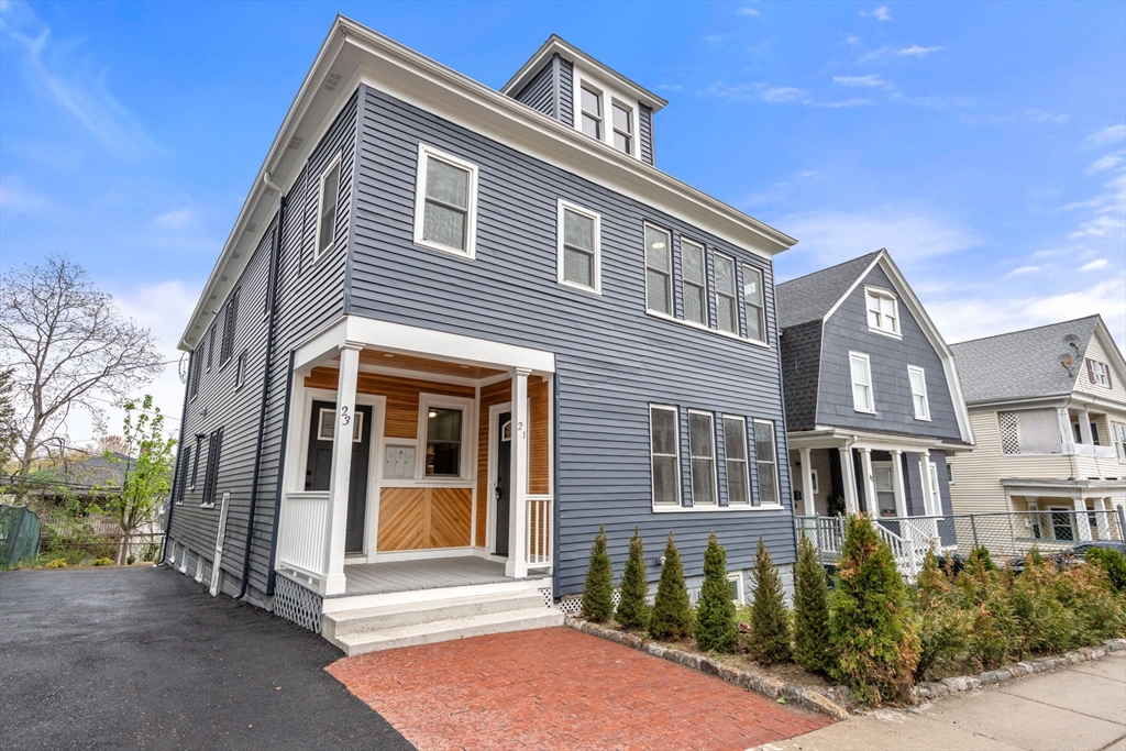 21-23 Westmore Road Boston, MA 02126 - Photo 41 of 42 a front view of a house