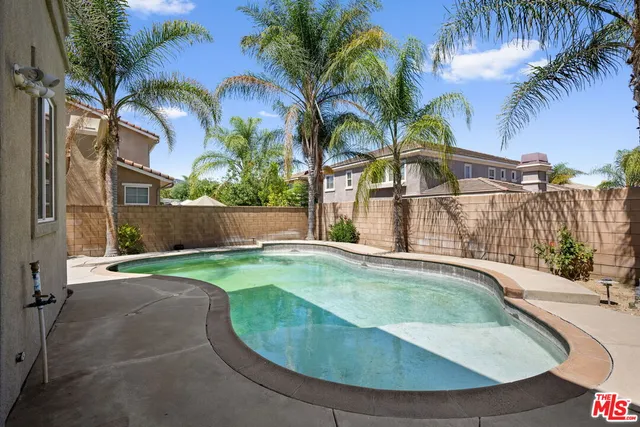 a view of a backyard with a garden